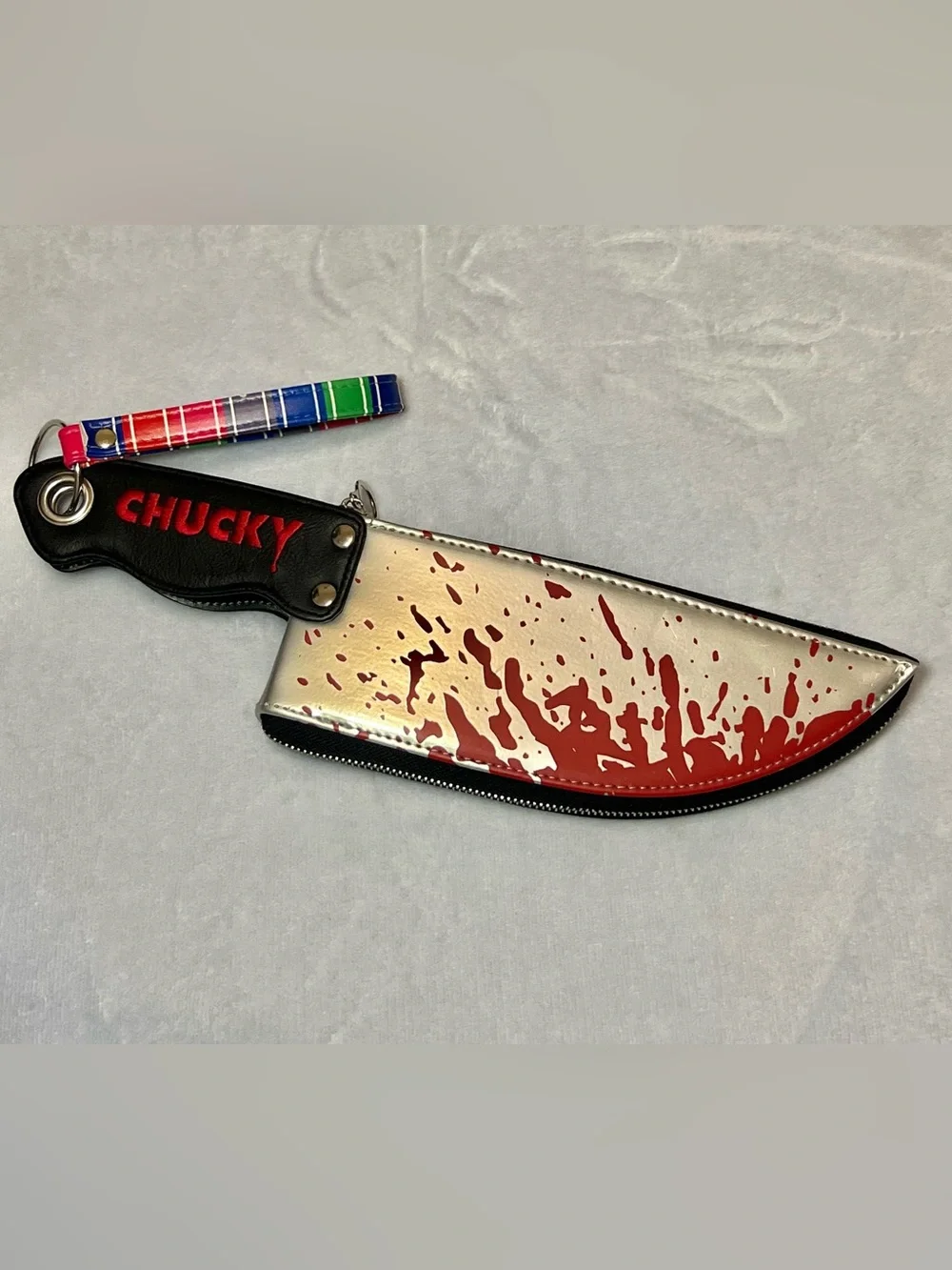 Spencer's Silver & Red Chucky Phone Case Pouch with Keyring Strap